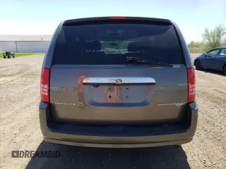 2010 Chrysler Town & Country Touring Plus with VIN 2A4RR8D11AR405610, listed as a Copart auction lot 54742655 with 56,380 mi miles and Salvage Title. Bid and sale history available at DreamBid. Image 6.