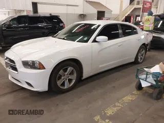 2013 Dodge Charger SE z VIN 2C3CDXBG9DH520241, wystawiony jako IAAI lot #41057114 z przebiegiem 148 768 mil mil oraz . Historia ofert i sprzedaży dostępna na DreamBid. Obrazek 18.