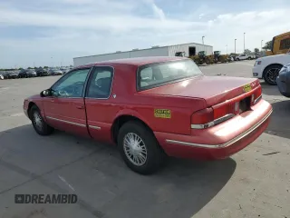 1997 Mercury Cougar z VIN 1MELM62W6VH618680, wystawiony jako Copart lot #53379985 z przebiegiem 123 474 mil mil oraz Szkody całkowita. Historia ofert i sprzedaży dostępna na DreamBid. Obrazek 2.