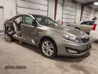 2012 Kia Optima EX z VIN 5XXGN4A7XCG075228, wystawiony jako IAAI lot #42188504 z przebiegiem 102 565 mil mil oraz . Historia ofert i sprzedaży dostępna na DreamBid. Obrazek 1.