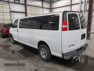 2014 Chevrolet Express Passenger LT with VIN 1GAZG1FG9E1127529, listed as a IAAI auction lot 42151349 with 192,333 mi miles and . Bid and sale history available at DreamBid. Image 3.