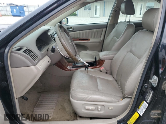 2006 Toyota Camry LE z VIN 4T1BF30K76U635823, wystawiony jako Copart lot #54246045 z przebiegiem 211 090 mil mil oraz Szkoda całkowita • Salvage title. Historia ofert i sprzedaży dostępna na DreamBid. Obrazek 7.