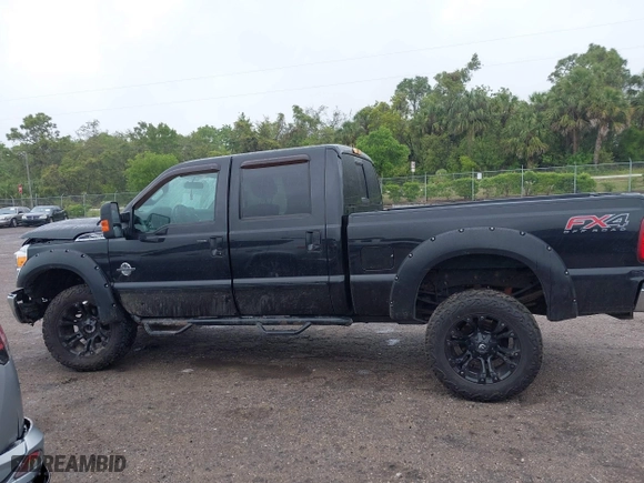 2015 Ford Super Duty F-250 SRW Lariat with VIN 1FT7W2BT7FED63648, listed as a IAAI auction lot 41988979 with 112,493 mi miles. Bid and sale history available at carsss.com. Image 14.