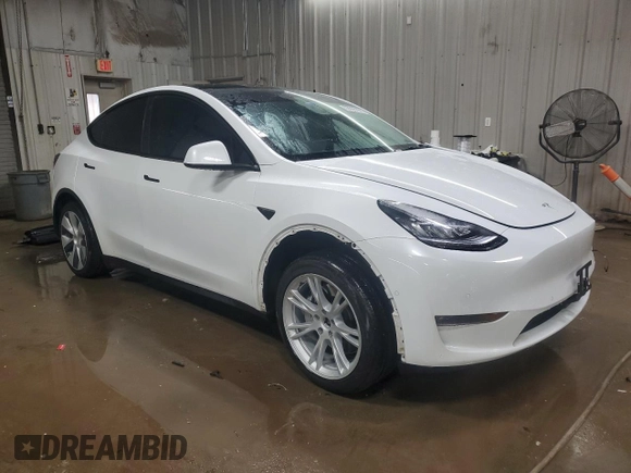 2021 Tesla Model Y Long Range with VIN 5YJYGDEE4MF231016, listed as a Copart auction lot 50908475 with 35,216 mi miles and Salvage Title. Bid and sale history available at DreamBid. Image 4.