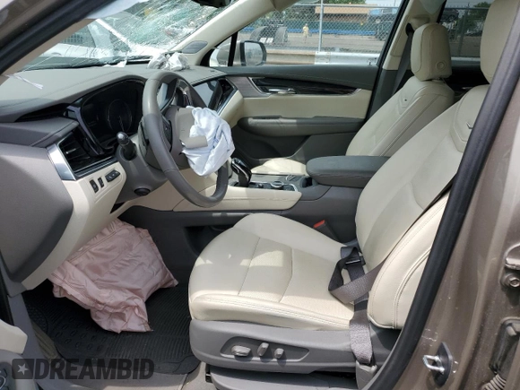 2022 Cadillac XT6 Premium Luxury with VIN 1GYKPDRS5NZ180296, listed as a Copart auction lot 59081184 with 21,380 mi miles and Salvage title. Bid and sale history available at DreamBid. Image 7.