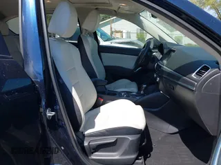 2016 Mazda CX-5 Grand Touring with VIN JM3KE4DY5G0681369, listed as a IAAI auction lot 42102805 with 128,182 mi miles and . Bid and sale history available at DreamBid. Image 5.