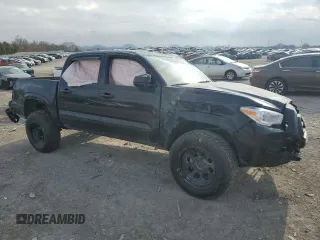 2023 Toyota Tacoma SR with VIN 3TMCZ5ANXPM607248, listed as a Copart auction lot 44156725 with 30,595 mi miles and Salvage title. Bid and sale history available at DreamBid. Image 4.