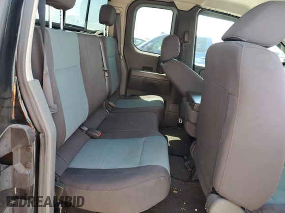2006 Nissan Titan SE z VIN 1N6BA06A66N569501, wystawiony jako Copart lot #59872455 z przebiegiem 80 057 mil mil oraz Szkoda całkowita • Salvage title. Historia ofert i sprzedaży dostępna na DreamBid. Obrazek 10.