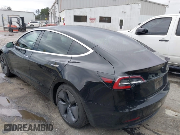 2019 Tesla Model 3 Mid Range with VIN 5YJ3E1EA3KF313425, listed as a IAAI auction lot 41806388 with 110,767 mi miles and . Bid and sale history available at carsss.com. Image 3.