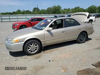 2001 Toyota Camry LE z VIN JT2BF22K410317078, wystawiony jako Copart lot #53157125 z przebiegiem 294 710 mil mil oraz Szkoda całkowita • Salvage title. Historia ofert i sprzedaży dostępna na DreamBid. Obrazek 1.