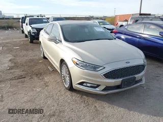 2017 Ford Fusion Titanium z VIN 3FA6P0SU5HR373140, wystawiony jako IAAI lot #41082406 z przebiegiem 98 422 mil mil oraz . Historia ofert i sprzedaży dostępna na DreamBid. Obrazek 3.