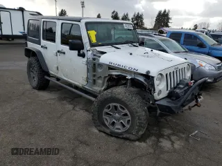 2015 Jeep Wrangler Unlimited Rubicon with VIN 1C4BJWFGXFL693566, listed as a Copart auction lot 46628765 with 70,128 mi miles and Salvage Title. Bid and sale history available at carsss.com. Image 4.