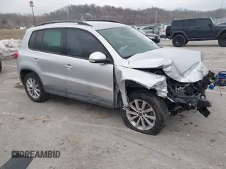 2015 Volkswagen Tiguan SE with VIN WVGAV7AX5FW592216, listed as a IAAI auction lot 41401020 with 110,726 mi miles and . Bid and sale history available at DreamBid. Image 1.