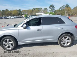 2020 Audi Q3 Premium with VIN WA1AECF36L1057823, listed as a IAAI auction lot 41912118 with 71,004 mi miles and . Bid and sale history available at DreamBid. Image 14.