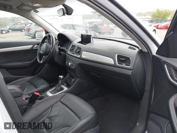 2017 Audi Q3 Premium z VIN WA1ECCFS7HR007729, wystawiony jako IAAI lot #42066580 z przebiegiem 116 460 mil mil oraz . Historia ofert i sprzedaży dostępna na DreamBid. Obrazek 5.