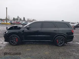 2021 Dodge Durango SRT Hellcat with VIN 1C4SDJH95MC643177, listed as a IAAI auction lot 41007139 with 31,650 mi miles and . Bid and sale history available at DreamBid. Image 15.