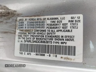 2012 Honda Odyssey EX-L with VIN 5FNRL5H63CB063815, listed as a IAAI auction lot 42302937 with 377,768 mi miles and . Bid and sale history available at DreamBid. Image 9.