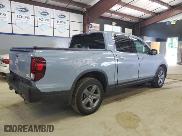 2023 Honda Ridgeline RTL-E with VIN 5FPYK3F77PB001460, listed as a Copart auction lot 61383785 with 27,423 mi miles and Salvage title. Bid and sale history available at DreamBid. Image 3.