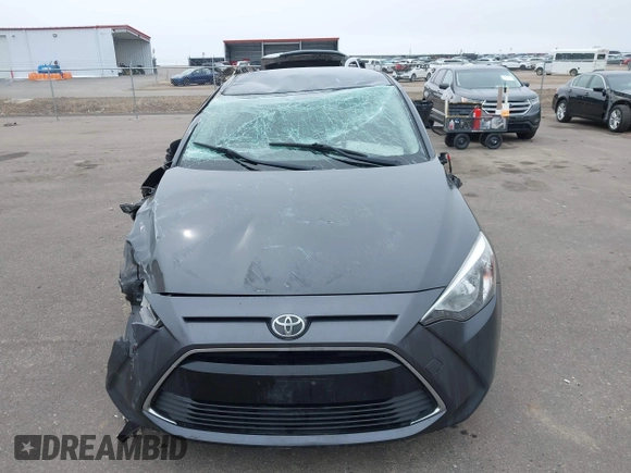 2018 Toyota Yaris with VIN 3MYDLBYV9JY321158, listed as a IAAI auction lot 41937684 with 85,020 mi miles and . Bid and sale history available at DreamBid. Image 12.