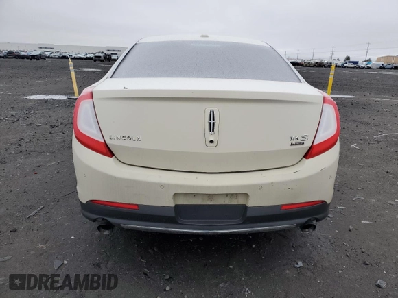 2014 Lincoln MKS EcoBoost с VIN 1LNHL9FT7EG601089, выставлен на аукционе Copart как лот 49483605 с пробегом 121 709 миль миль и Списание • Salvage title. История ставок и продаж доступна на DreamBid. Изображение 6.