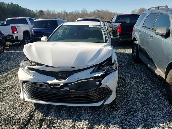 2019 Toyota Camry LE with VIN 4T1B11HK0KU719418, listed as a Copart auction lot 41380975 with 56,937 mi miles and Salvage Title. Bid and sale history available at carsss.com. Image 10.