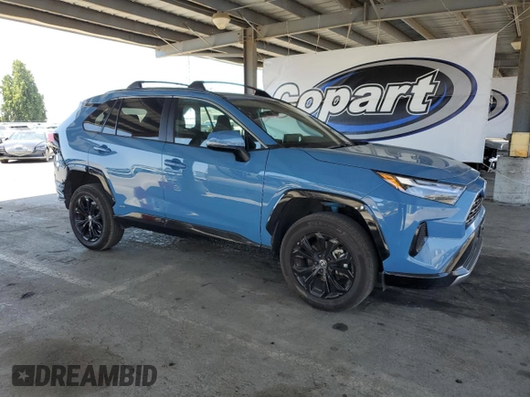 2022 Toyota RAV4 Hybrid SE with VIN 4T3T6RFV7NU103423, listed as a Copart auction lot 59709215 with 27,595 mi miles and Salvage title. Bid and sale history available at DreamBid. Image 4.