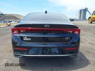 2021 Kia K5 LXS z VIN 5XXG14J25MG052084, wystawiony jako IAAI lot #42237008 z przebiegiem 31 278 mil mil oraz . Historia ofert i sprzedaży dostępna na DreamBid. Obrazek 16.