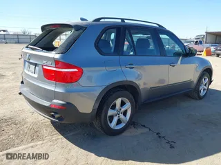 2007 BMW X5 3.0si with VIN 5UXFE43557L011481, listed as a IAAI auction lot 41764468 with 116,770 mi miles. Bid and sale history available at carsss.com. Image 4.