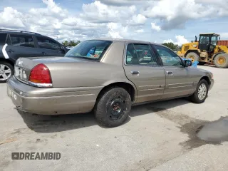 2003 Ford Crown Victoria LX с VIN 2FAHP74W63X124565, выставлен на аукционе Copart как лот 71051034 с пробегом 89 976 миль миль и Списание • Salvage title. История ставок и продаж доступна на DreamBid. Изображение 3.