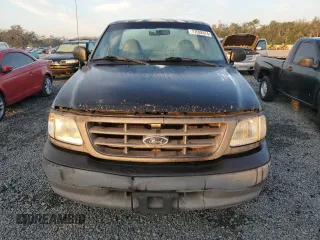 2003 Ford F-150 XL with VIN 1FTRF17W13NA97772, listed as a Copart auction lot 77692074 with Not Provided miles and Salvage Title. Bid and sale history available at DreamBid. Image 5.