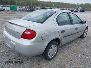 2005 Dodge Neon SE with VIN 1B3ES26C35D205066, listed as a IAAI auction lot 41943955 with 129,821 mi miles. Bid and sale history available at carsss.com. Image 4.