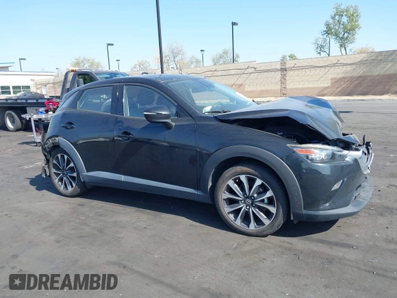 2019 Mazda CX-3 Touring with VIN JM1DKDC7XK1406974, listed as a IAAI auction lot 42047455 with 68,313 mi miles. Bid and sale history available at carsss.com. Image 14.