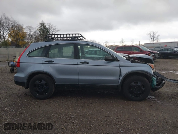 2009 Honda CR-V LX with VIN 5J6RE48339L016522, listed as a IAAI auction lot 40783609 with 209,891 mi miles. Bid and sale history available at carsss.com. Image 13.