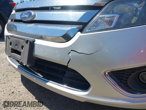 2012 Ford Fusion Hybrid z VIN 3FADP0L3XCR380817, wystawiony jako IAAI lot #42755712 z przebiegiem 81 220 mil mil oraz . Historia ofert i sprzedaży dostępna na DreamBid. Obrazek 6.