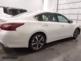 2017 Nissan Altima 2.5 SR with VIN 1N4AL3AP5HC265540, listed as a IAAI auction lot 41284731 with 125,504 mi miles. Bid and sale history available at carsss.com. Image 13.