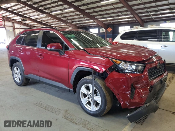 2019 Toyota RAV4 XLE with VIN JTMP1RFV8KD013013, listed as a Copart auction lot 50964245 with 70,656 mi miles and Salvage Title. Bid and sale history available at carsss.com. Image 4.