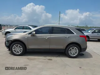 2018 Cadillac XT5 FWD with VIN 1GYKNARS5JZ145739, listed as a IAAI auction lot 42443337 with 50,917 mi miles and . Bid and sale history available at DreamBid. Image 14.