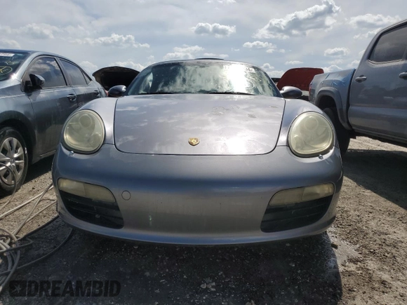 2005 Porsche Boxster с VIN WP0CA29875U711919, выставлен на аукционе Copart как лот 74299934 с пробегом Не указан миль и На запчасти • Non repairable. История ставок и продаж доступна на DreamBid. Изображение 5.