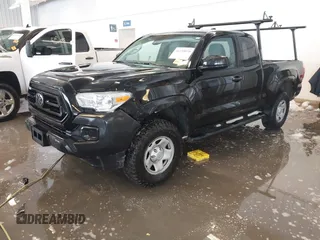 2023 Toyota Tacoma SR with VIN 3TYRX5GN2PT069110, listed as a IAAI auction lot 41235858 with 60,019 mi miles and . Bid and sale history available at DreamBid. Image 2.