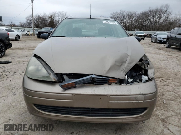 2003 Ford Focus LX with VIN 1FAFP33P73W114861, listed as a Copart auction lot 44859405 with 100,574 mi miles and Salvage Title. Bid and sale history available at carsss.com. Image 5.