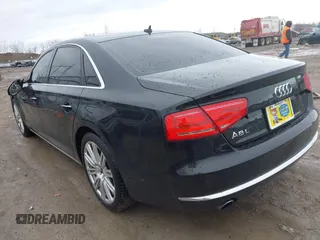 2014 Audi A8 3.0T z VIN WAURGAFD5EN004118, wystawiony jako IAAI lot #41919506 z przebiegiem 182 382 mil mil oraz . Historia ofert i sprzedaży dostępna na DreamBid. Obrazek 3.