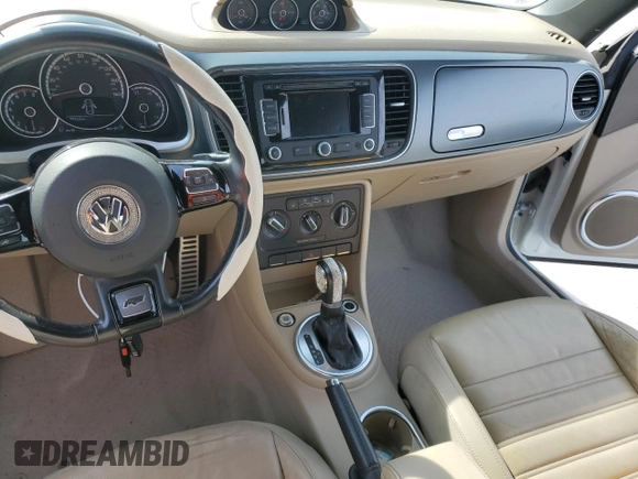 2014 Volkswagen Beetle with VIN 3VW7S7AT5EM815435, listed as a Copart auction lot 43213645 with 109,082 mi miles and Salvage Title. Bid and sale history available at DreamBid. Image 8.