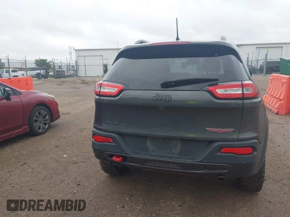 2016 Jeep Cherokee Trailhawk z VIN 1C4PJMBS7GW372623, wystawiony jako IAAI lot #42336107 z przebiegiem 231 887 mil mil oraz . Historia ofert i sprzedaży dostępna na DreamBid. Obrazek 16.