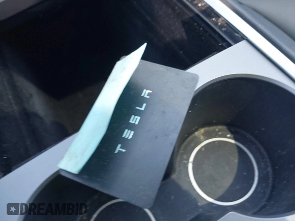 2022 Tesla Model Y Long Range z VIN 7SAYGDEE4NA006645, wystawiony jako IAAI lot #42192495 z przebiegiem 28 784 mil mil oraz . Historia ofert i sprzedaży dostępna na DreamBid. Obrazek 11.