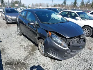 2019 Ford Fiesta SE with VIN 3FADP4EJ3KM140068, listed as a IAAI auction lot 41826466 with 64,277 mi miles. Bid and sale history available at carsss.com. Image 1.