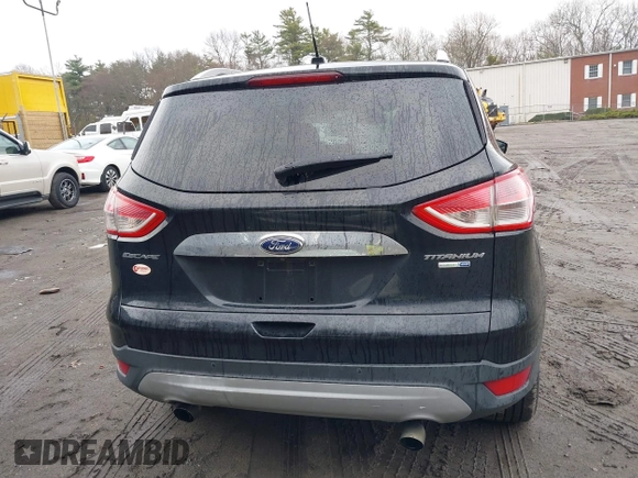 2014 Ford Escape Titanium with VIN 1FMCU9J99EUD38866, listed as a IAAI auction lot 42052579 with 202,337 mi miles. Bid and sale history available at carsss.com. Image 16.