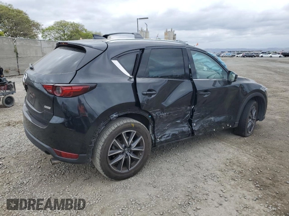 2018 Mazda CX-5 Grand Touring with VIN JM3KFADM3J1370114, listed as a Copart auction lot 54579585 with 65,513 mi miles and Salvage Title. Bid and sale history available at DreamBid. Image 3.