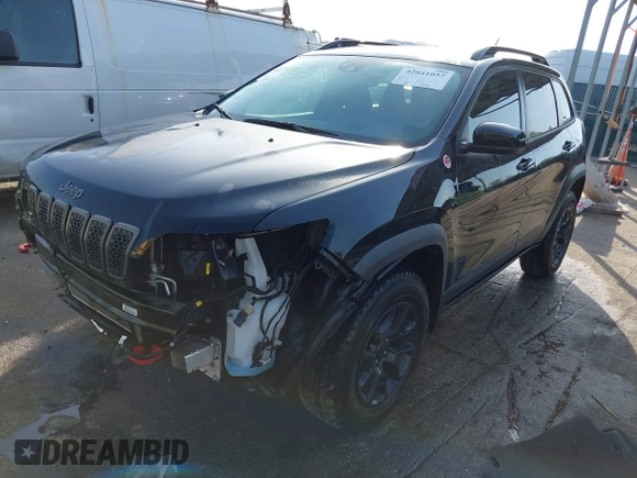 2022 Jeep Cherokee Trailhawk with VIN 1C4PJMBX1ND533715, listed as a IAAI auction lot 42041057 with 65,487 mi miles and . Bid and sale history available at DreamBid. Image 18.