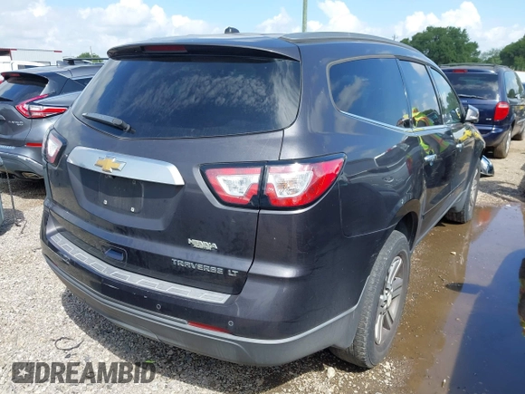 2015 Chevrolet Traverse LT with VIN 1GNKRGKD7FJ127555, listed as a IAAI auction lot 42676564 with 127,962 mi miles and . Bid and sale history available at DreamBid. Image 4.