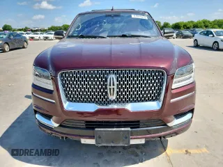 2019 Lincoln Navigator Reserve z VIN 5LMJJ2LT4KEL14574, wystawiony jako Copart lot #61821615 z przebiegiem 86 695 mil mil oraz Czysty tytuł • Clean title. Historia ofert i sprzedaży dostępna na DreamBid. Obrazek 5.